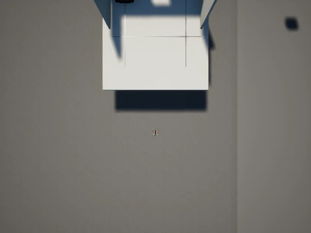 Saved overhead simulator image of a fictional structure and a small drone